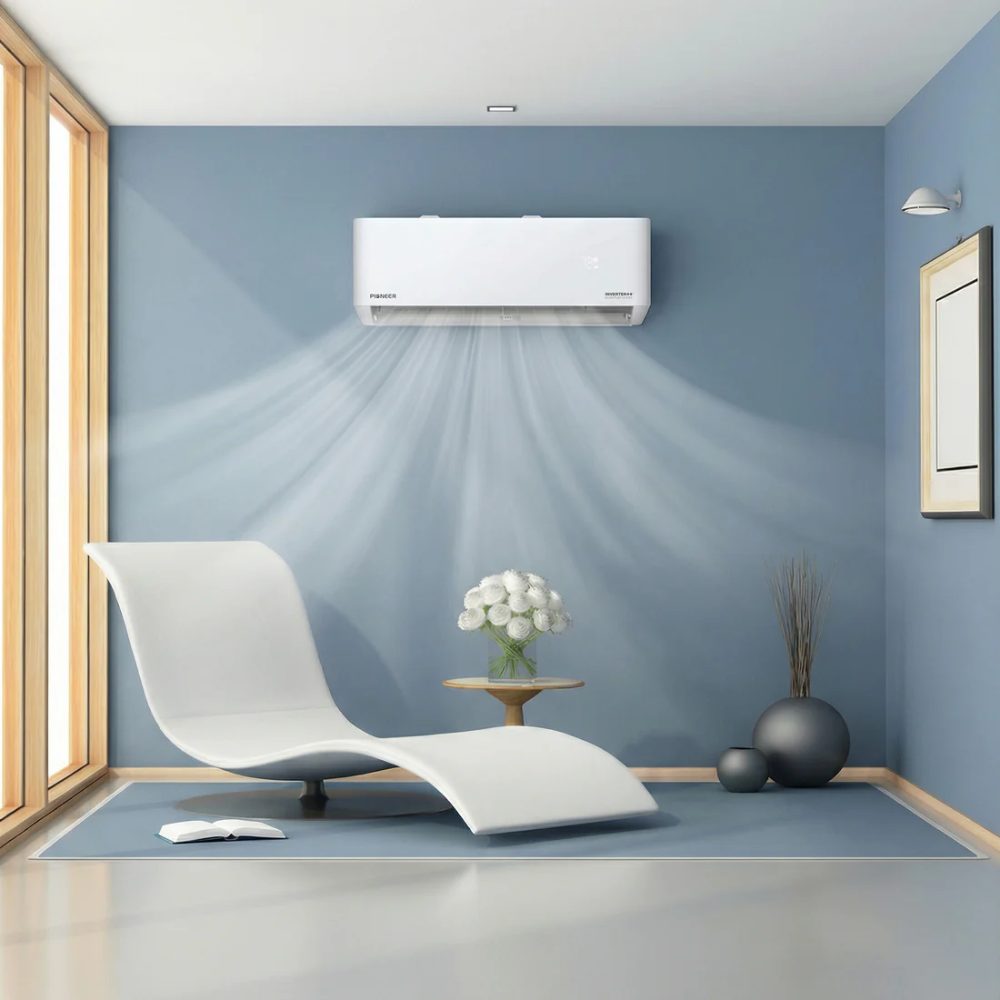 Modern living room with white wall-mounted air conditioning unit cooling the blue space